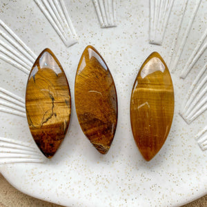 Pendentif percé en Oeil de Tigre (protection / courage / force)
