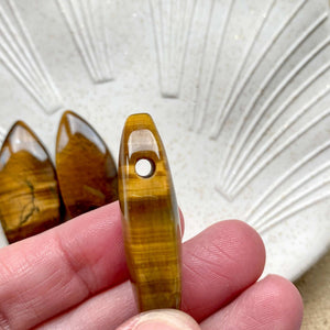 Pendentif percé en Oeil de Tigre (protection / courage / force)